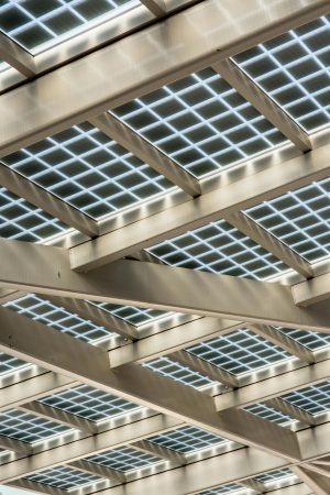 pexels-photo-29407508-29407508 Abstract view of a modern solar panel structure with geometric patterns.